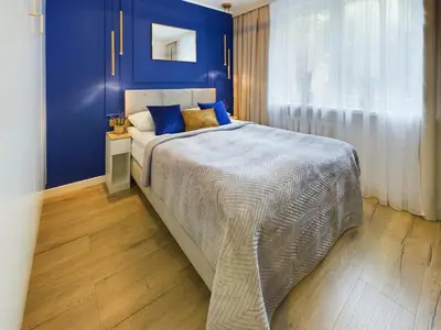 Łóżko lub łóżka w pokoju w obiekcie Unique Studio for 2 people Wilanowska in Warsaw by Noclegi Renters
