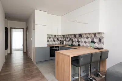 Kuchnia lub aneks kuchenny w obiekcie Metro Bemowo Apartment with Garden by BookingHost