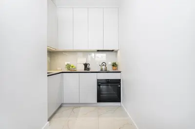 Kuchnia lub aneks kuchenny w obiekcie SuperApart Domaniewska apt 120 - Parking