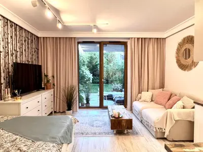 Telewizja i/lub zestaw kina domowego w obiekcie Botanical Escape Warsaw