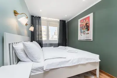 Łóżko lub łóżka w pokoju w obiekcie Apartament Pańska 61 by Your Freedom