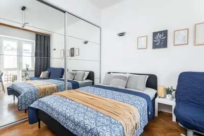 Łóżko lub łóżka w pokoju w obiekcie SuperApart Tarchomińska apt 20 - Studio z Wi-Fi