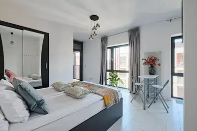 Łóżko lub łóżka w pokoju w obiekcie Urbannestgroup - Krochmalna 59