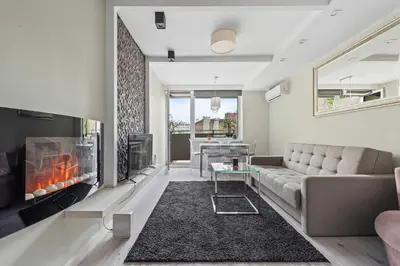 Część wypoczynkowa w obiekcie RentPlanet - Apartament Mokotowska
