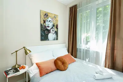 Łóżko lub łóżka w pokoju w obiekcie Koszykowa 3 - Better Rental
