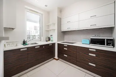 Kuchnia lub aneks kuchenny w obiekcie Stawki Pleasant Apartment by BookingHost