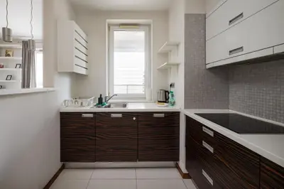 Kuchnia lub aneks kuchenny w obiekcie Stawki Pleasant Apartment by BookingHost