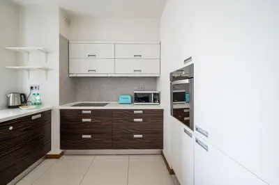 Kuchnia lub aneks kuchenny w obiekcie Stawki Pleasant Apartment by BookingHost