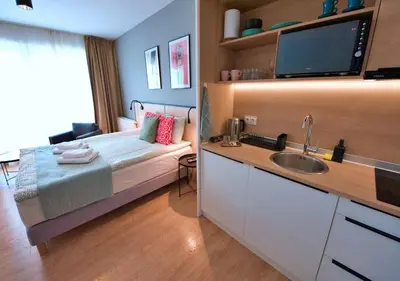 Telewizja i/lub zestaw kina domowego w obiekcie BK Aparthotel Praga - National Stadium - Comfortable Apartment for 4 people