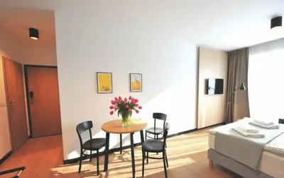 Łóżko lub łóżka w pokoju w obiekcie BK Aparthotel Praga - National Stadium - Comfortable Apartment for 4 people