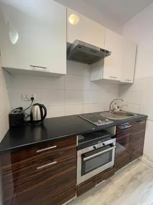 Kuchnia lub aneks kuchenny w obiekcie AirPort Apartment Cybernetyki 3c