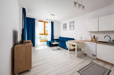 Kuchnia lub aneks kuchenny w obiekcie Wola Pleasant Apartment by BookingHost