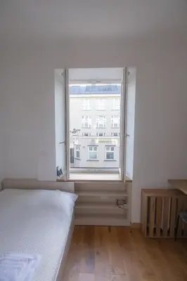 Łóżko lub łóżka w pokoju w obiekcie Micro Chmielna