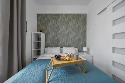 Łóżko lub łóżka w pokoju w obiekcie Downtown Apt - Top Location, City View, Bus&Tram - by Rentujemy