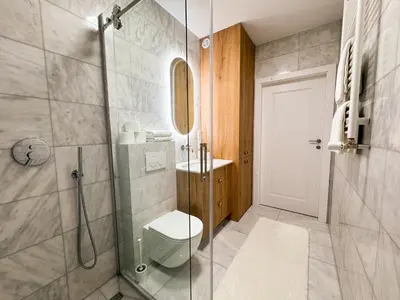 Łazienka w obiekcie FLH Harmony Suite