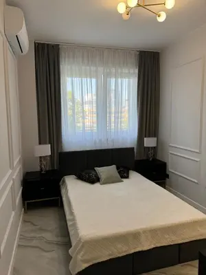 Łóżko lub łóżka w pokoju w obiekcie Apartament Krucza Centrum