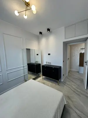 Łóżko lub łóżka w pokoju w obiekcie Apartament Krucza Centrum