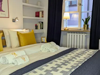 Łóżko lub łóżka w pokoju w obiekcie Bella Luna Luxury Suites - Spacious 1BR in Old Town