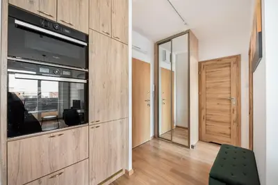Kuchnia lub aneks kuchenny w obiekcie Bemowo Narwik Stylish Apartment by BookingHost