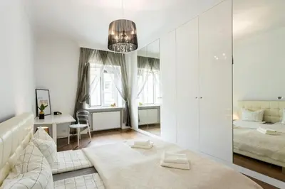 Łóżko lub łóżka w pokoju w obiekcie Urban Chic -One Bedroom Apartment - Warsaw Stays - Podwale