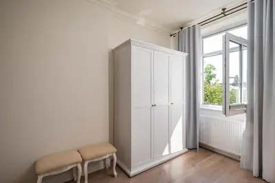 Łóżko lub łóżka w pokoju w obiekcie Praska Ostoja Apartment by BookingHost