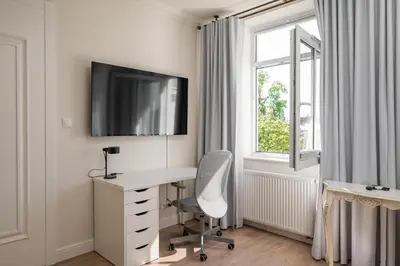 Telewizja i/lub zestaw kina domowego w obiekcie Praska Ostoja Apartment by BookingHost