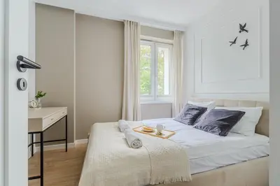 Łóżko lub łóżka w pokoju w obiekcie ShortStayPoland Kazimierza Wielkiego