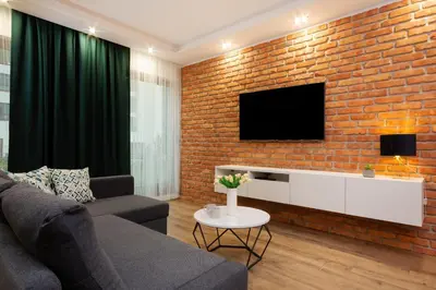 Telewizja i/lub zestaw kina domowego w obiekcie LUX Unique Rzeczypospolitej Apartment with Parking by Renters Prestige