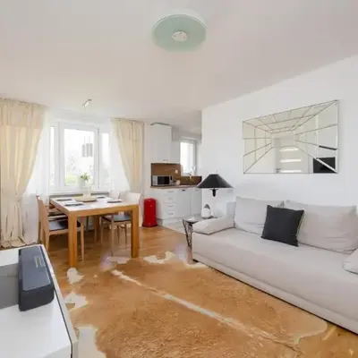 Bright Two-Bedroom Apartment by Noclegi Renters