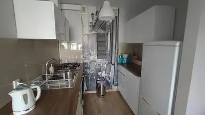 Kuchnia lub aneks kuchenny w obiekcie Lenki Apartamenty Metro Bródno