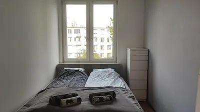 Łóżko lub łóżka w pokoju w obiekcie Lenki Apartamenty Metro Bródno
