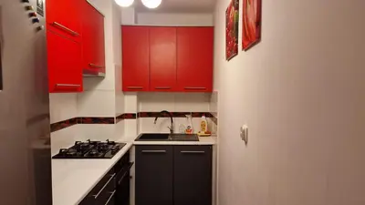 Kuchnia lub aneks kuchenny w obiekcie Grzybowska Pokoje Centrum