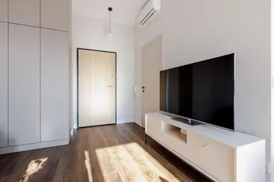 Telewizja i/lub zestaw kina domowego w obiekcie Bright Studio in Mokotów Business Center