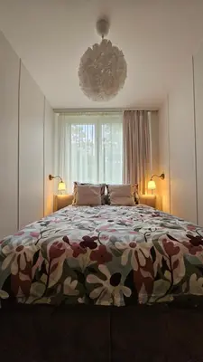 Łóżko lub łóżka w pokoju w obiekcie Apartament Metro