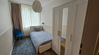 Łóżko lub łóżka w pokoju w obiekcie Apartament Metro