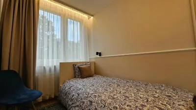 Łóżko lub łóżka w pokoju w obiekcie Apartament Metro