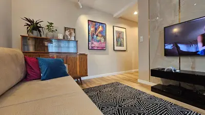 Telewizja i/lub zestaw kina domowego w obiekcie Apartament Metro