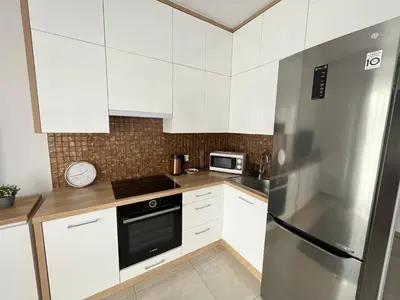 Kuchnia lub aneks kuchenny w obiekcie Kasprzaka 31 By Perfect Apart 231 Garaż