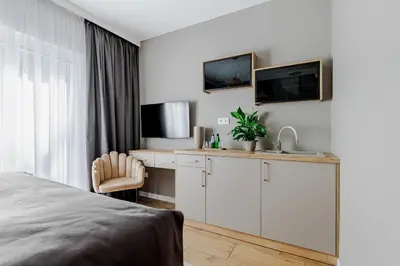 Łóżko lub łóżka w pokoju w obiekcie CISZA i SPOKÓJ