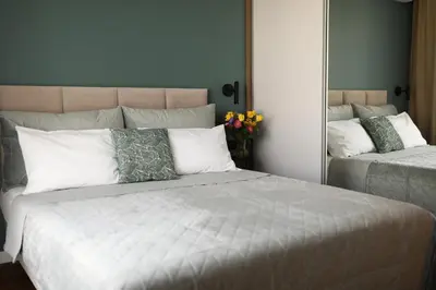 Łóżko lub łóżka w pokoju w obiekcie Apartament Zdziechowskiego with Parking and AC, Mokotów