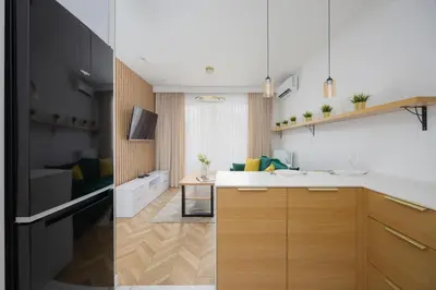 Kuchnia lub aneks kuchenny w obiekcie Nowoczesny Apartament z balkonem i miejscem parkingowym Warszawa Ursus by Noclegi Renters