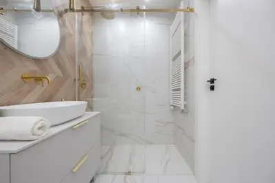 Łazienka w obiekcie Nowoczesny Apartament z balkonem i miejscem parkingowym Warszawa Ursus by Noclegi Renters