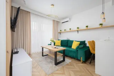 Część wypoczynkowa w obiekcie Nowoczesny Apartament z balkonem i miejscem parkingowym Warszawa Ursus by Noclegi Renters