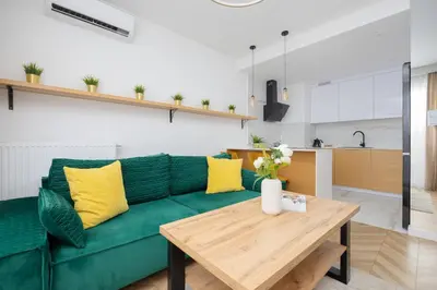 Część wypoczynkowa w obiekcie Nowoczesny Apartament z balkonem i miejscem parkingowym Warszawa Ursus by Noclegi Renters