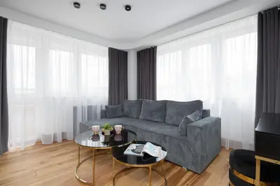 Część wypoczynkowa w obiekcie Central Warsaw Apartments near the Palace of Culture and Science by Noclegi Renters