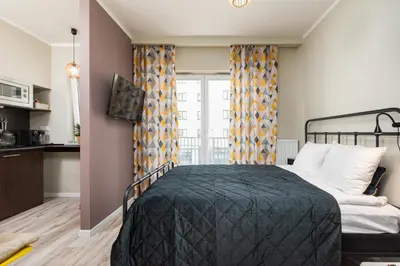 Łóżko lub łóżka w pokoju w obiekcie Jana Kazimierza 35 by Homeprime