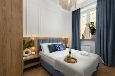 Łóżko lub łóżka w pokoju w obiekcie Movo Prestige Old Town Apartment