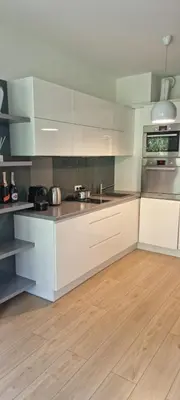 Kuchnia lub aneks kuchenny w obiekcie CITY CENTRE Warsaw Apartment Kolejowa EXPO