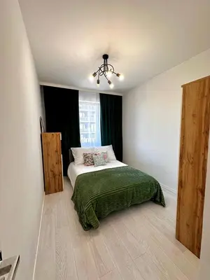 Łóżko lub łóżka w pokoju w obiekcie Apartament blisko dworca Warszawa Zachodnia, miejsce parkingowe w cenie