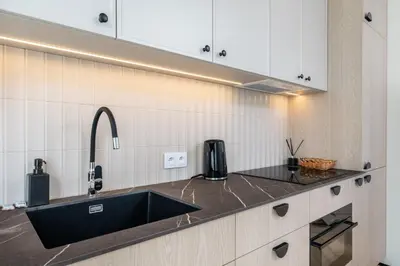 Kuchnia lub aneks kuchenny w obiekcie Kombucha Premium Apartment Wynalazek